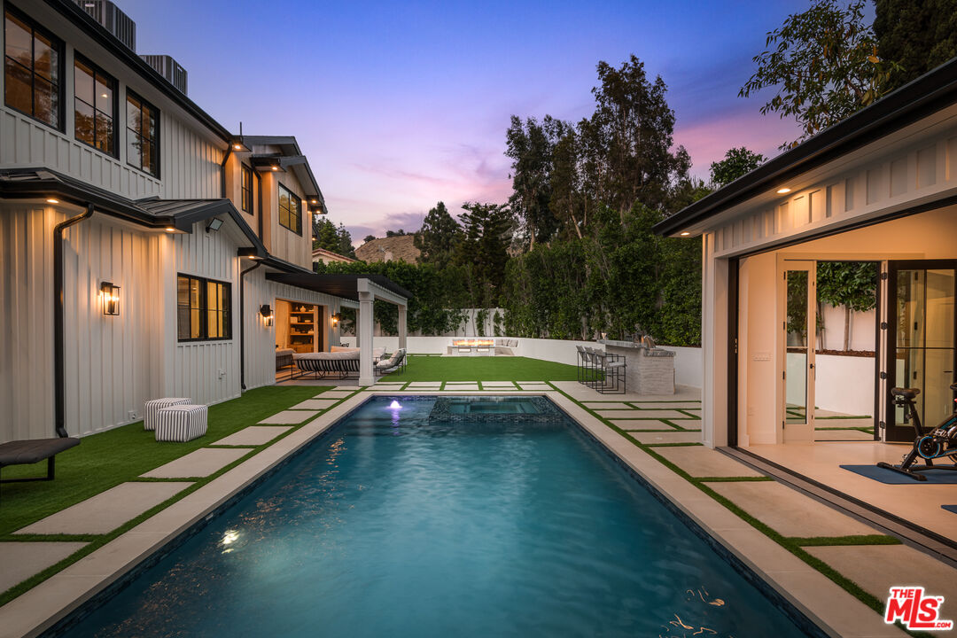6310 Mirror Drive Los Angeles, CA 90068 - Photo 5 of 49 a view of a house with swimming pool