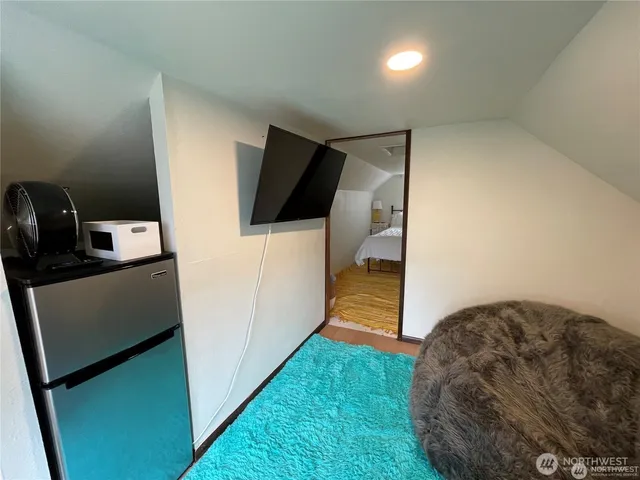 a view of hallway with washer and dryer
