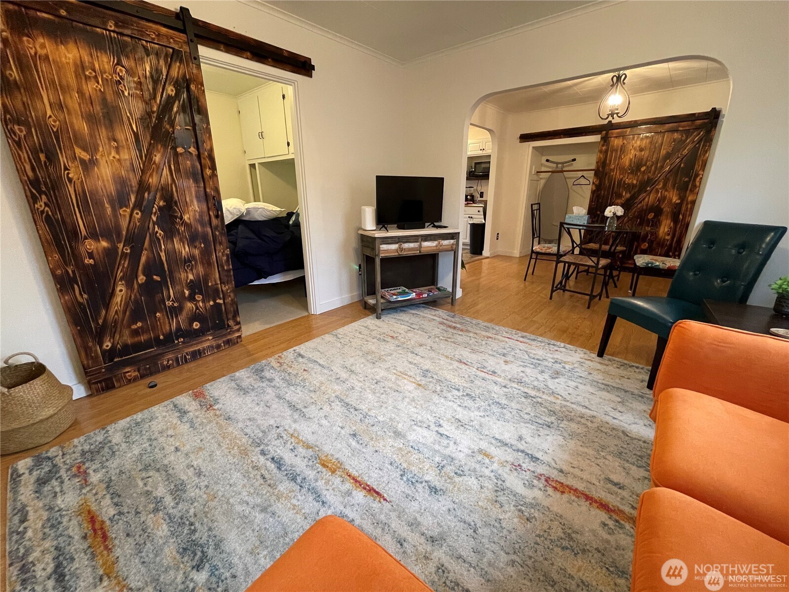 1707-1721 Fowler Road Raymond, WA 98577 - Photo 6 of 21 a living room with furniture and a flat screen tv