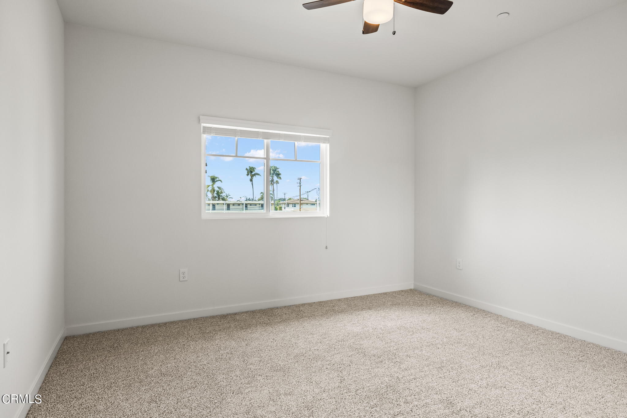 305 North F Street, Unit 201 Oxnard, CA 93030 - Photo 18 of 30 an empty room with a window