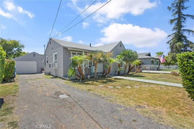 a view of a house with basketball court