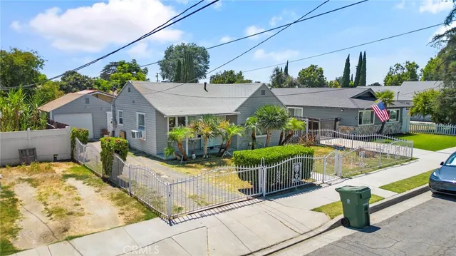 an aerial view of a house with swimming pool