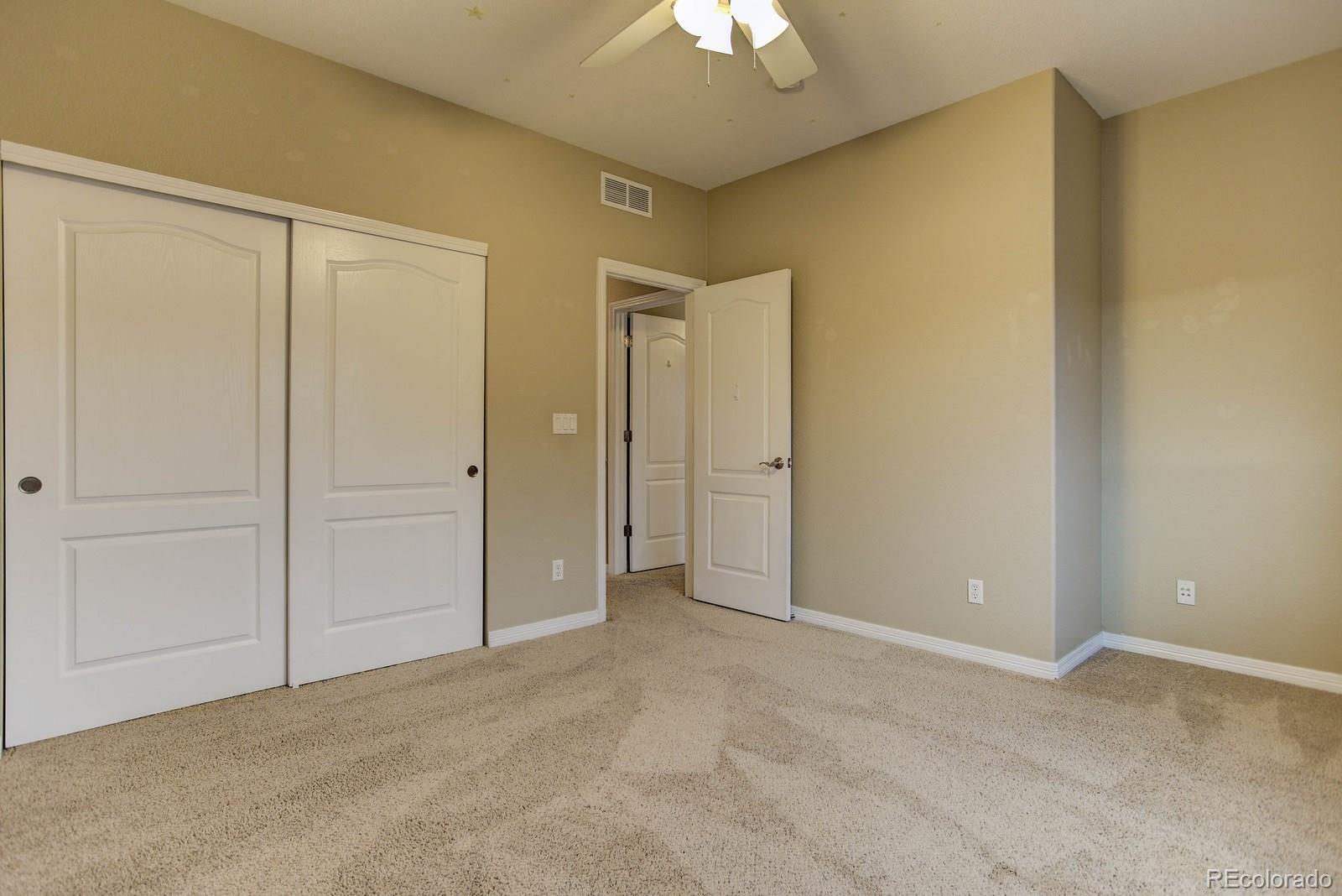 10879 Glengate Circle Highlands Ranch, CO 80130 - Photo 30 of 35 a view of an empty room