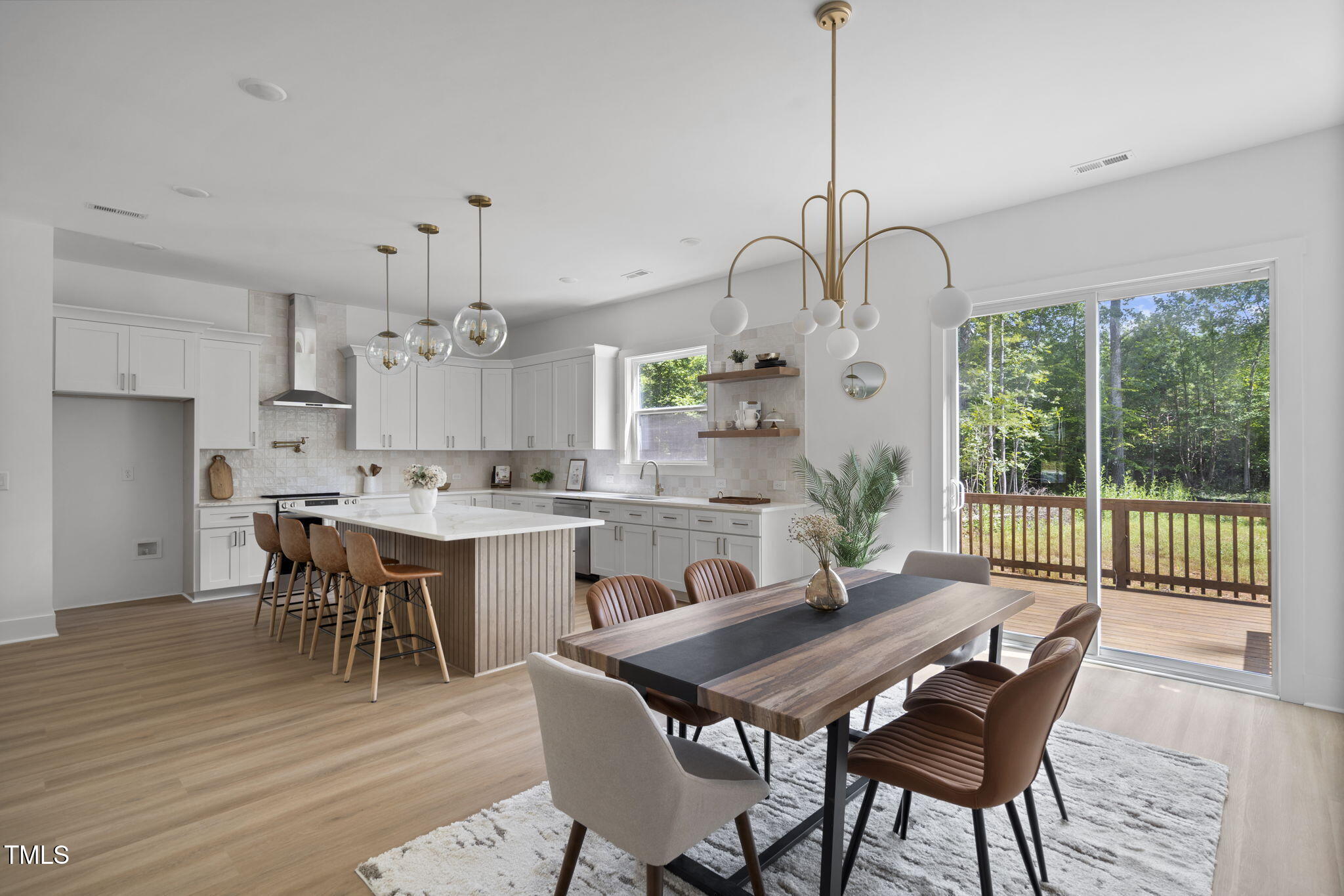 712 Oaks Lane Road Timberlake, NC 27583 - Photo 14 of 47 a view of a dining room with furniture window and wooden floor