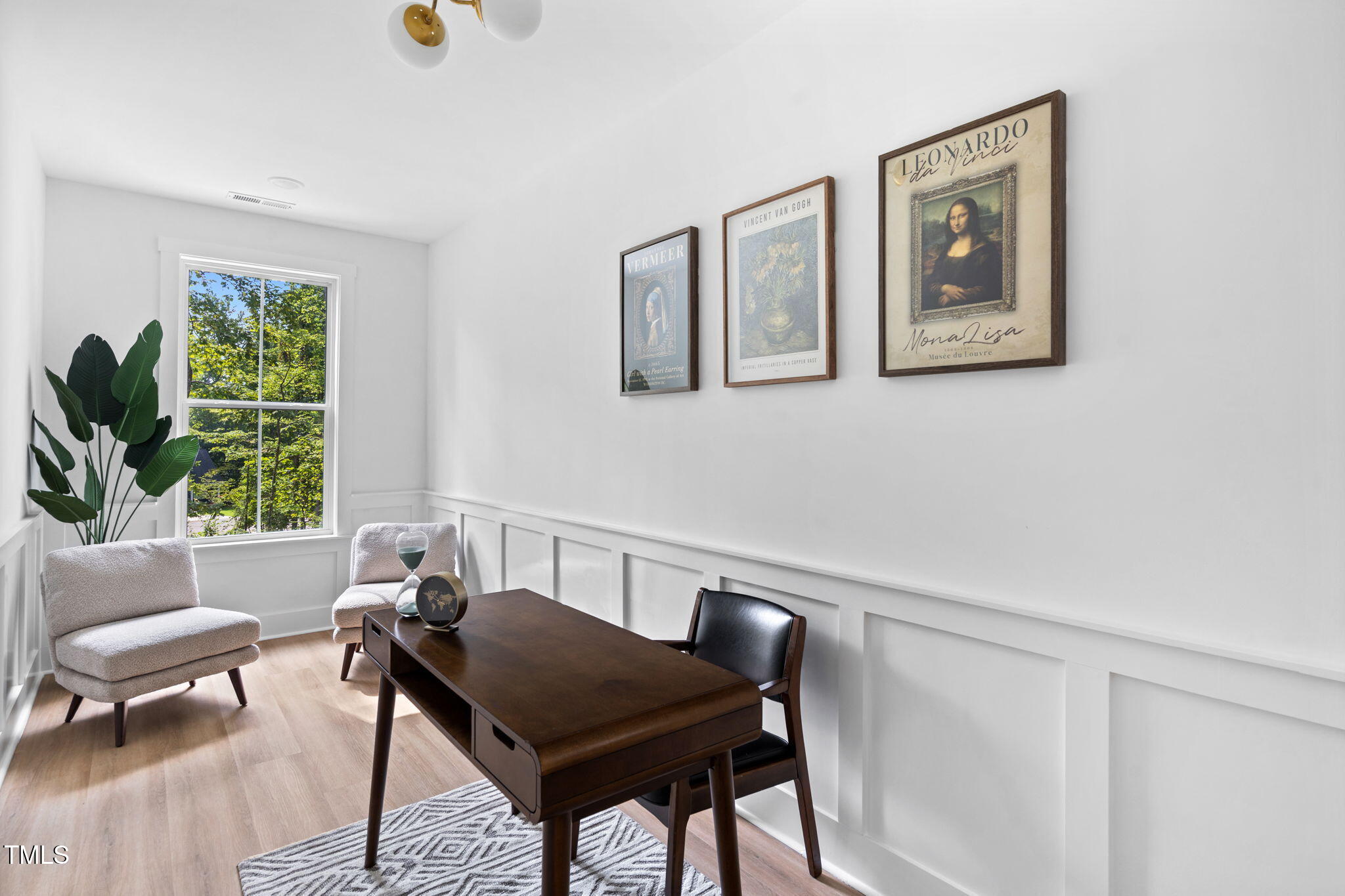 712 Oaks Lane Road Timberlake, NC 27583 - Photo 23 of 47 a living room with furniture and a potted plant