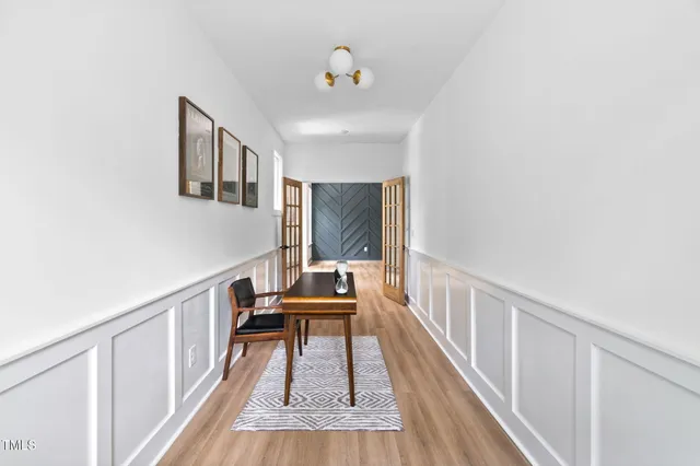 a view of entryway with wooden floor
