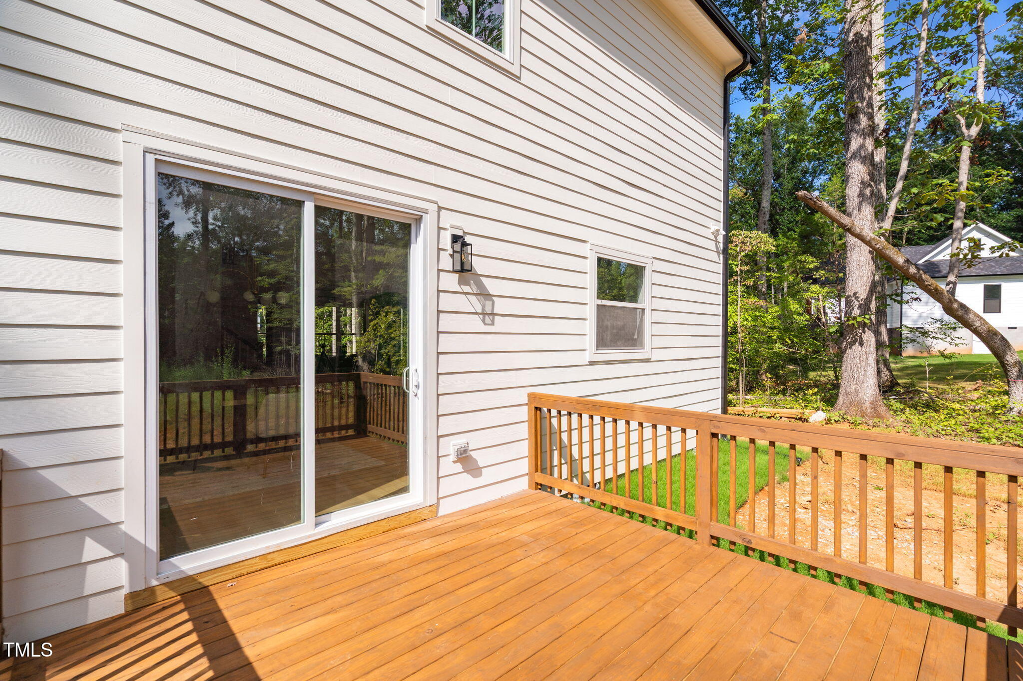 712 Oaks Lane Road Timberlake, NC 27583 - Photo 36 of 47 a view of a house with a balcony
