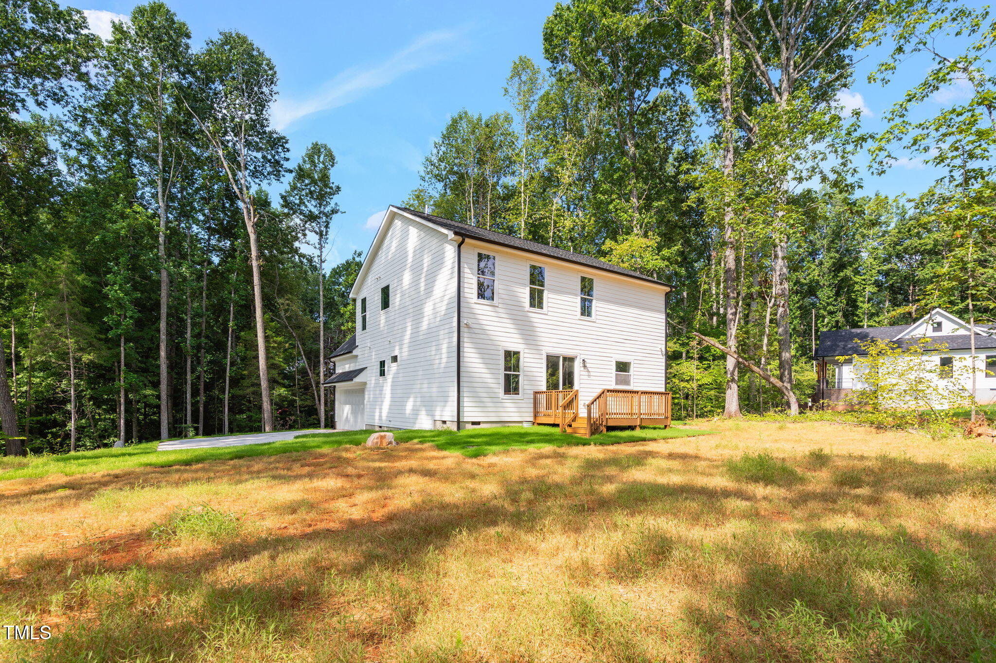 712 Oaks Lane Road Timberlake, NC 27583 - Photo 38 of 47 a view of a house with a big yard