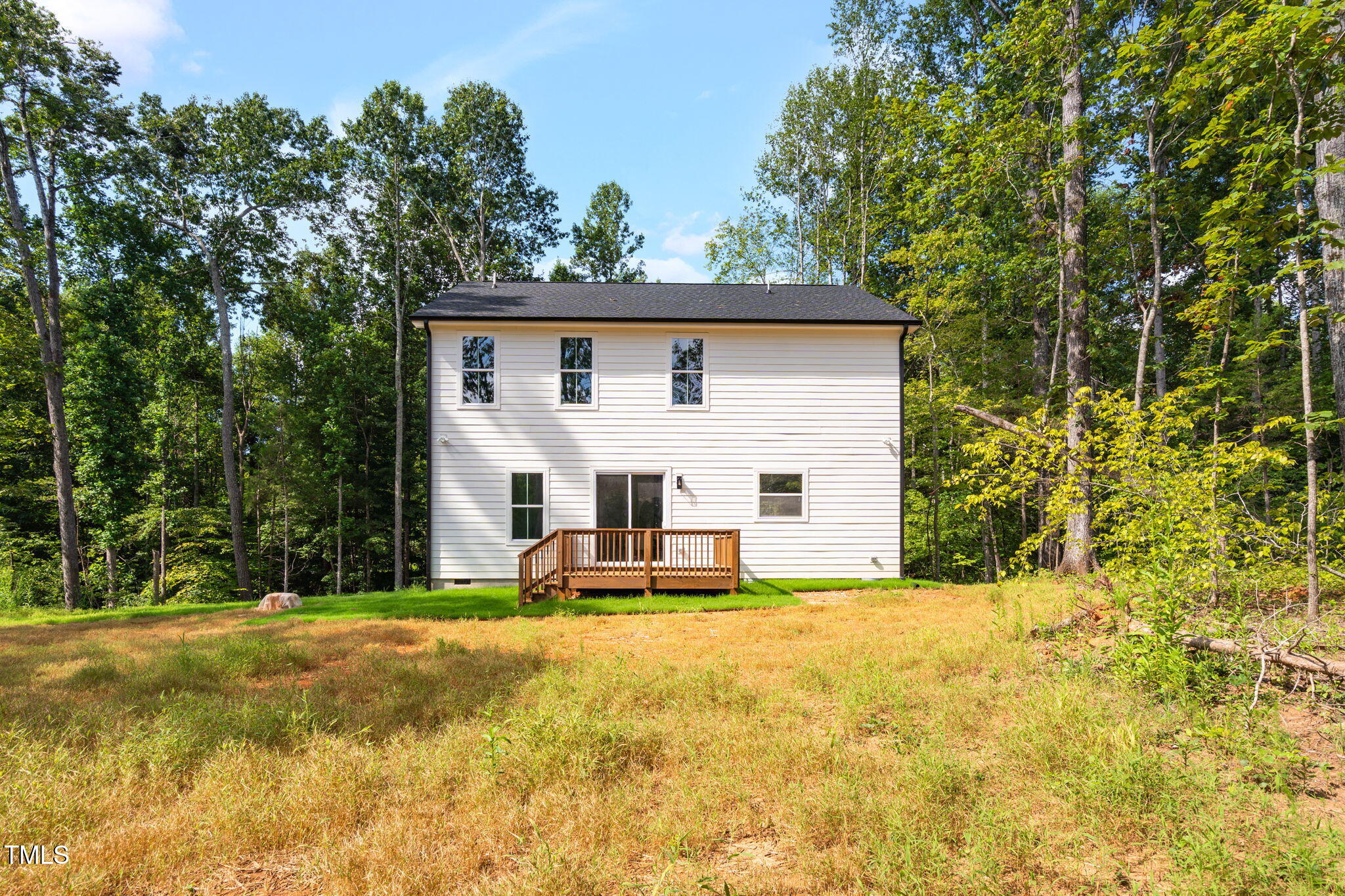 712 Oaks Lane Road Timberlake, NC 27583 - Photo 39 of 47 a view of a house with a yard