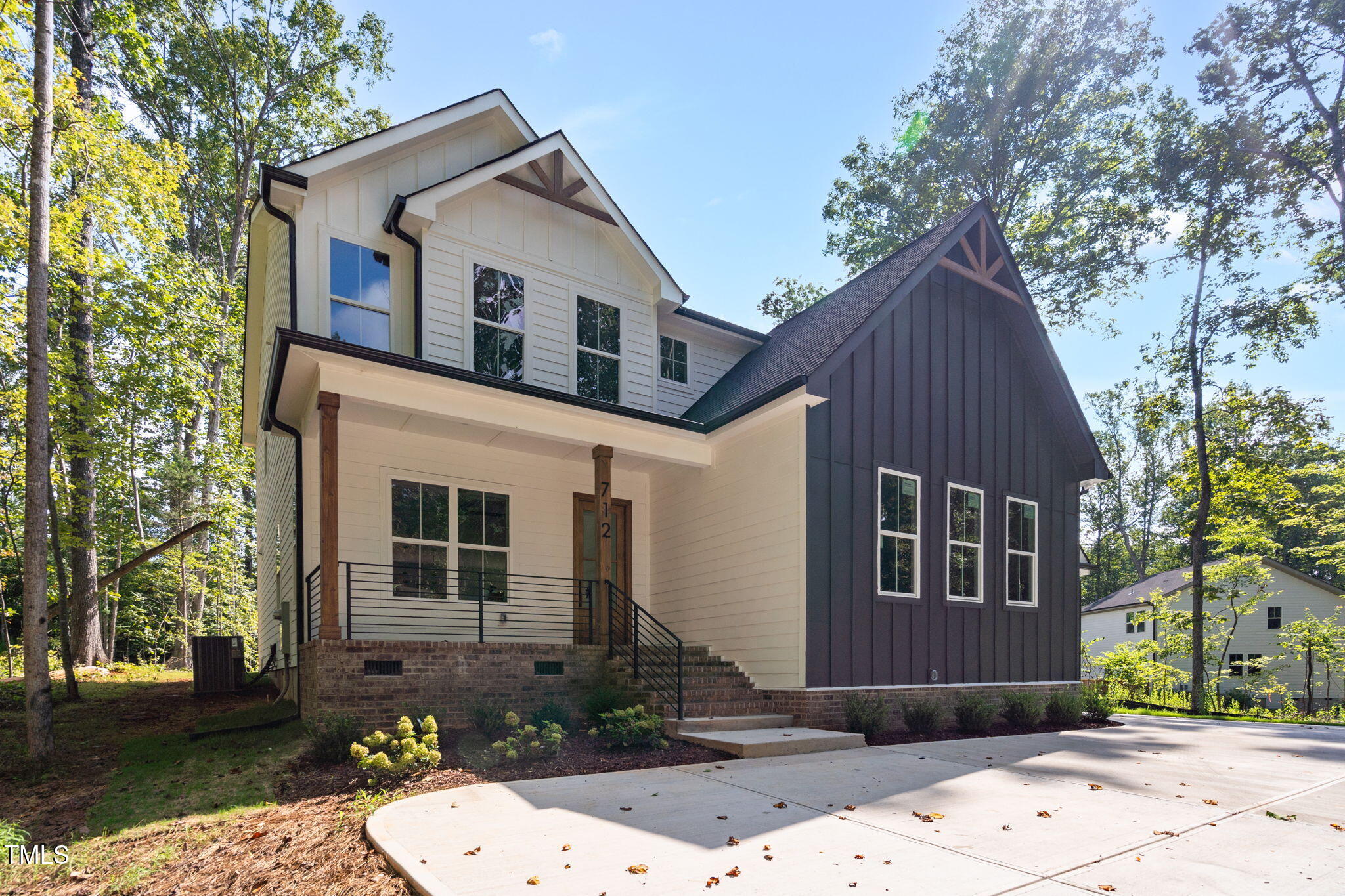 712 Oaks Lane Road Timberlake, NC 27583 - Photo 4 of 47 a front view of a house with a yard