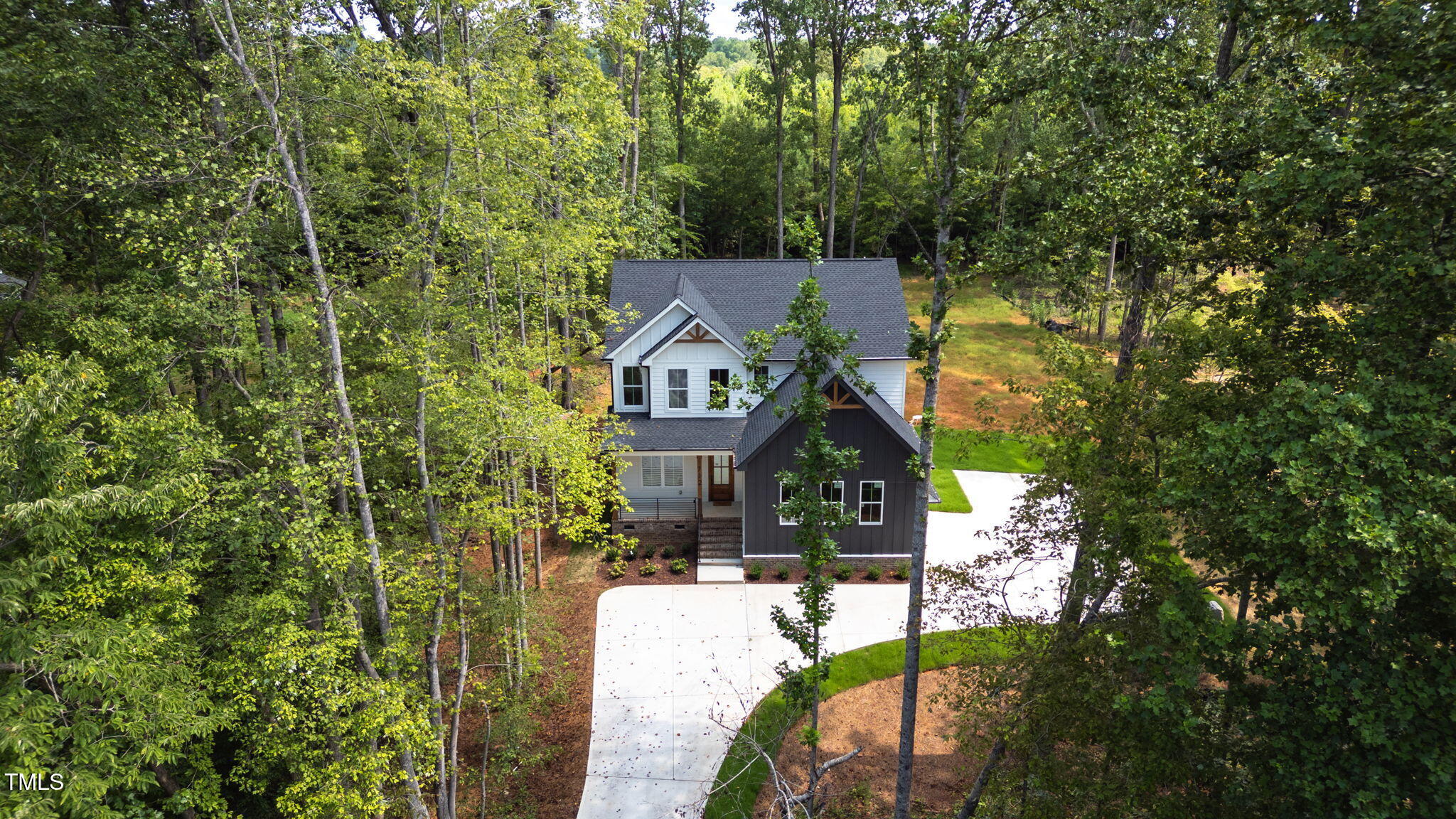 712 Oaks Lane Road Timberlake, NC 27583 - Photo 42 of 47 a front view of a house with a yard