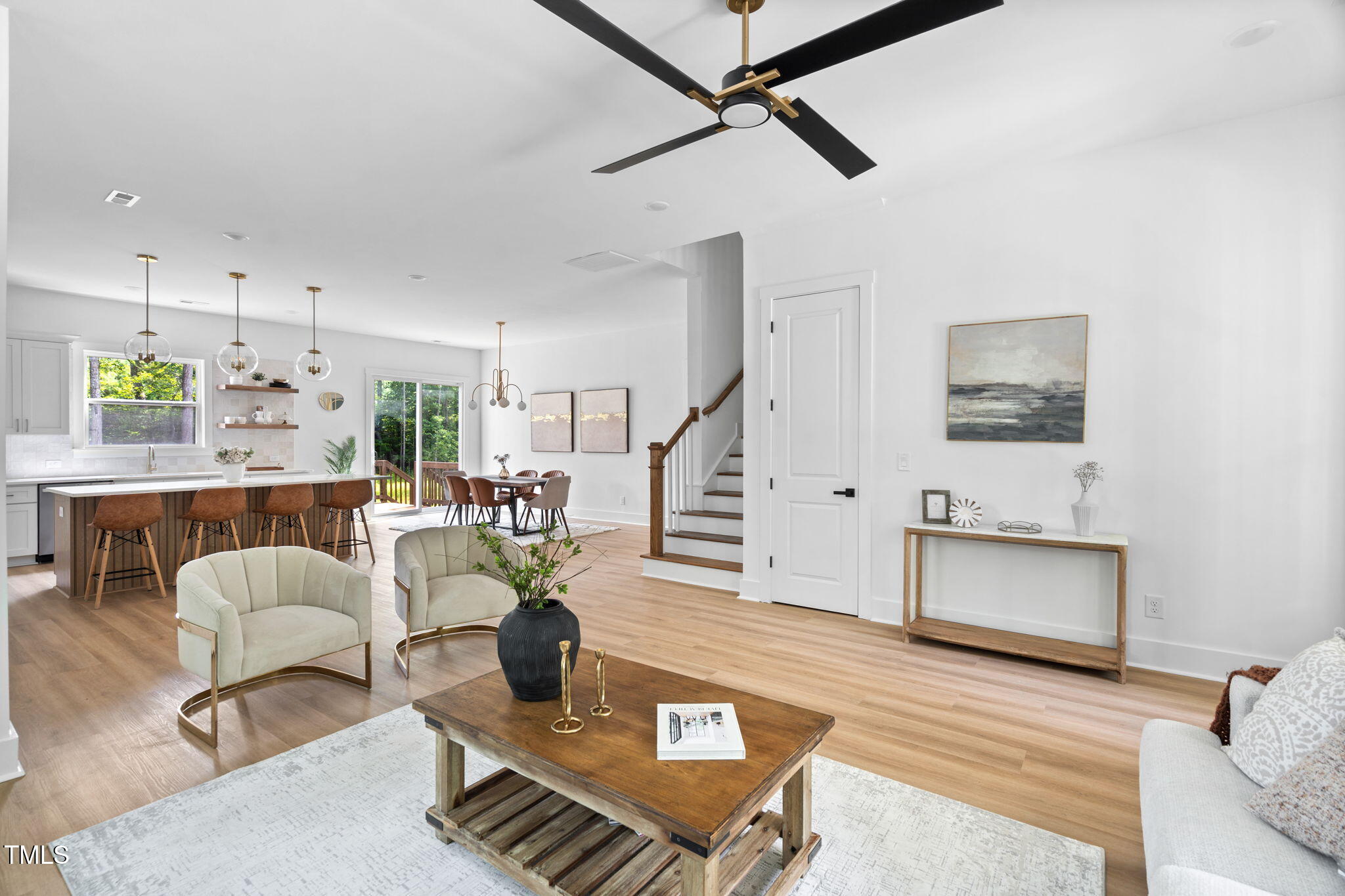 712 Oaks Lane Road Timberlake, NC 27583 - Photo 6 of 47 a living room with furniture and a wooden floor