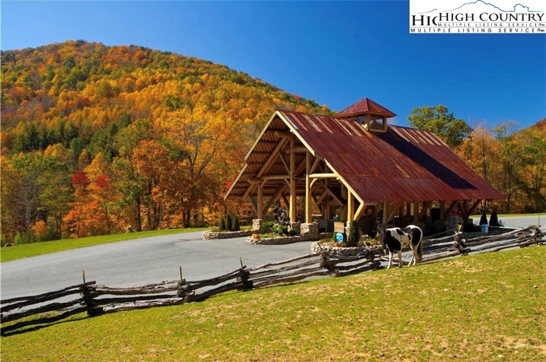 Es-61 Rippling Waters Trail Banner Elk, NC 28604 - Photo 4 of 16 a view of a swimming pool with a bench and trees