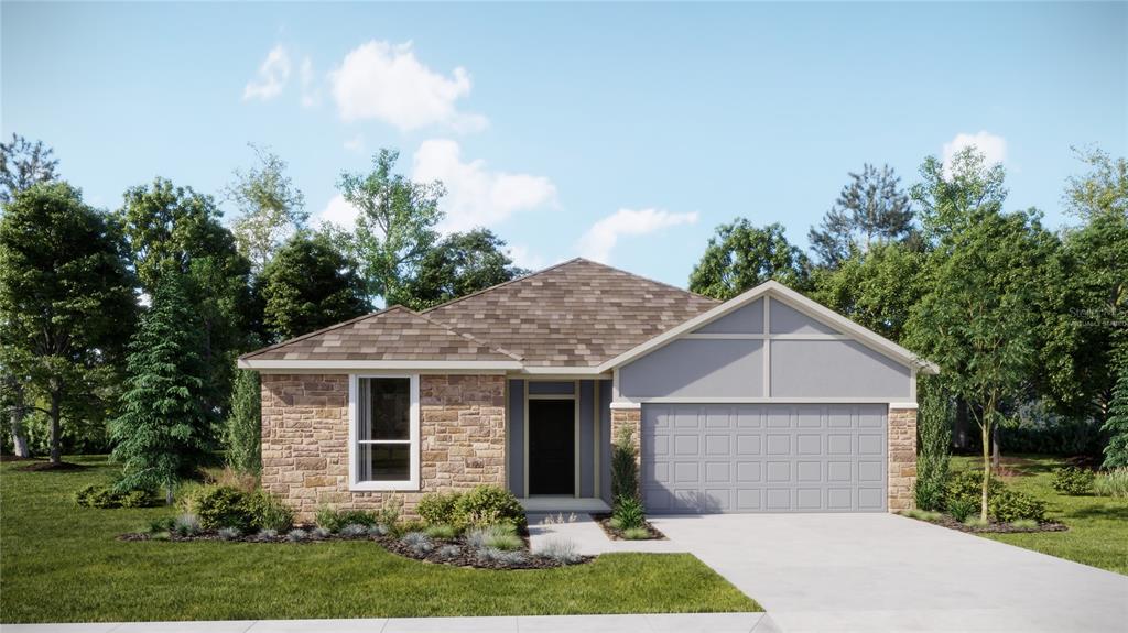 917 Tundra Loop Groveland, FL 34736 - Photo 1 of 1 a front view of a house with garden