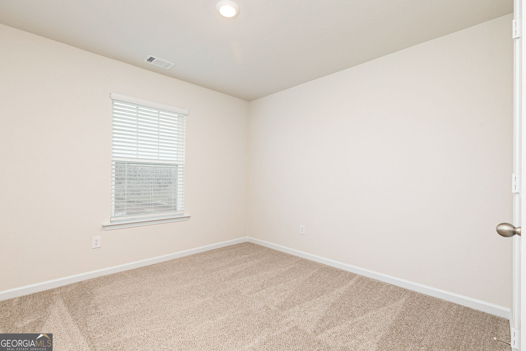 1513 Big Lane Locust Grove, GA 30248 - Photo 20 of 39 an empty room with a window