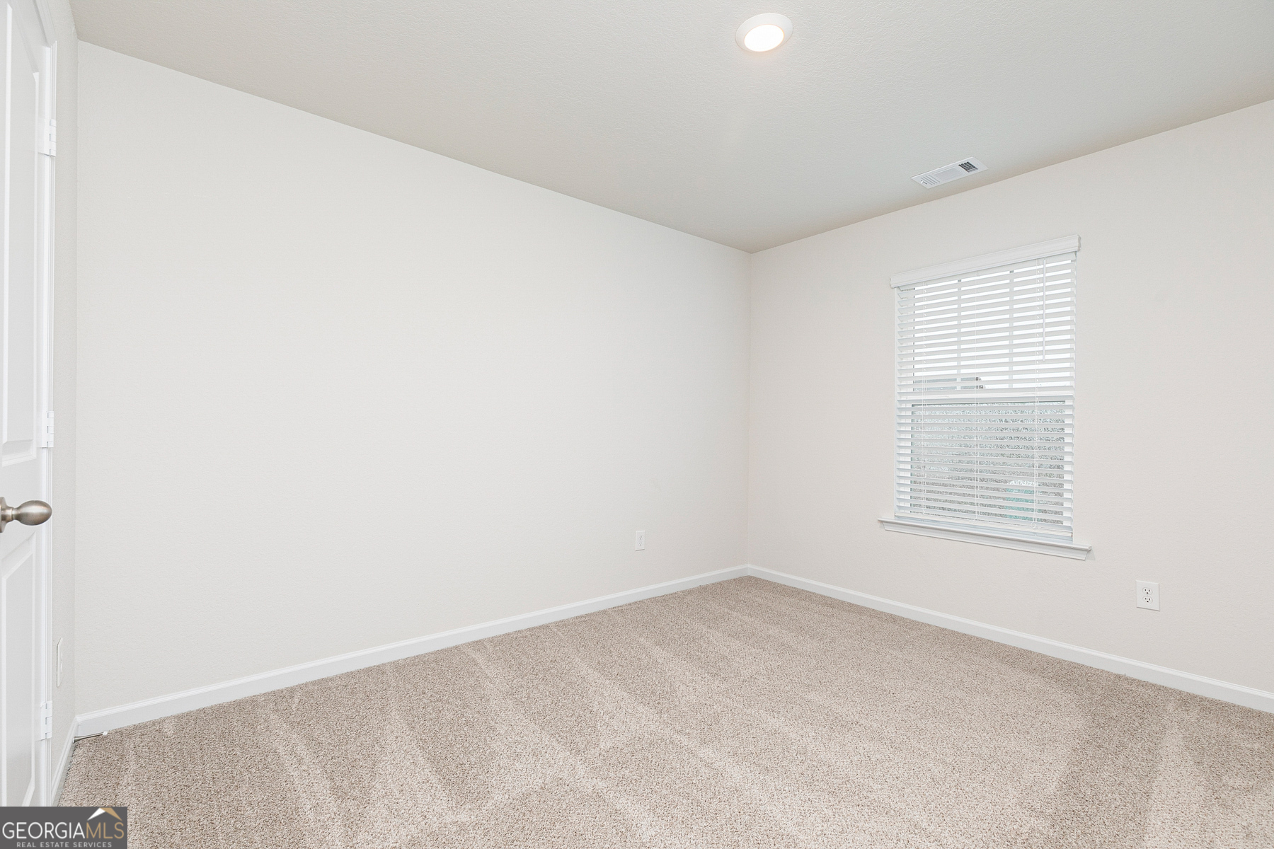 1513 Big Lane Locust Grove, GA 30248 - Photo 21 of 39 an empty room with a window