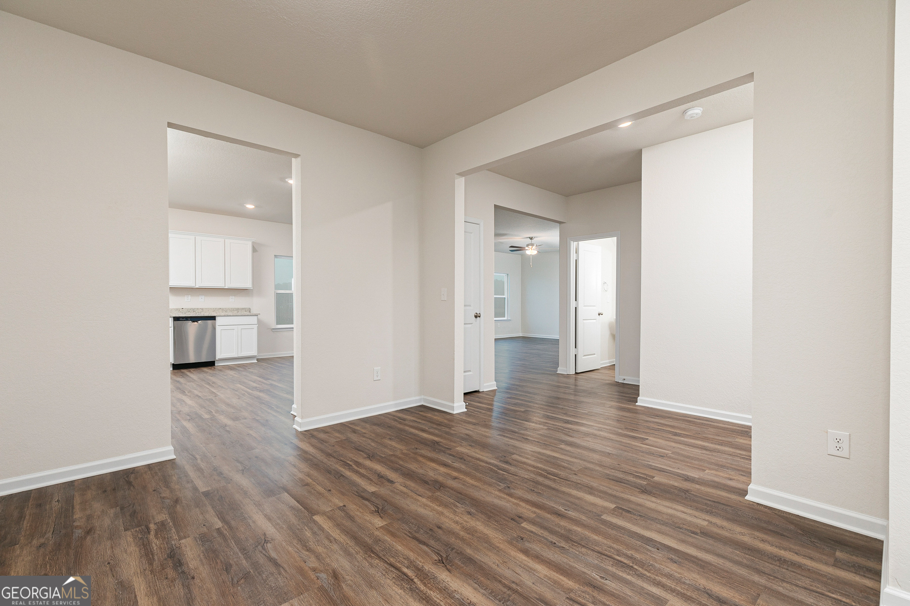 1513 Big Lane Locust Grove, GA 30248 - Photo 5 of 39 a view of empty room with wooden floor