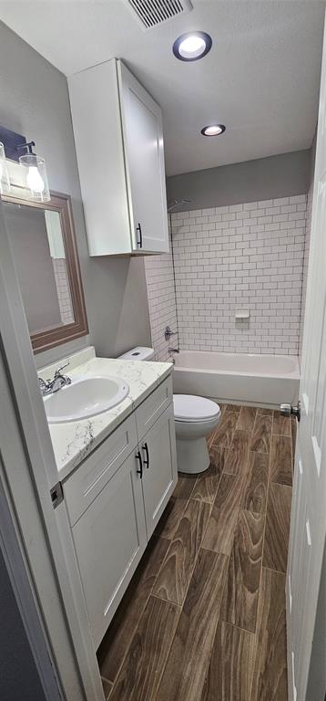 433 Ard Road Seagoville, TX 75159 - Photo 15 of 16 a bathroom with a granite countertop sink a toilet and a mirror