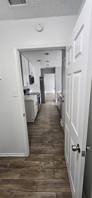 433 Ard Road Seagoville, TX 75159 - Photo 8 of 16 a room with a washer and dryer