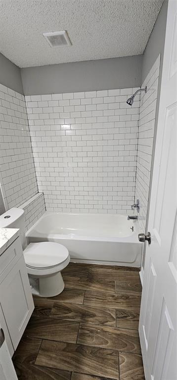 433 Ard Road Seagoville, TX 75159 - Photo 10 of 16 a bathroom with a toilet and a shower