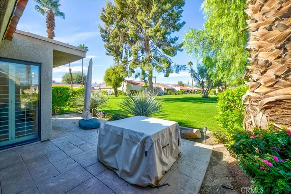 a view of a porch with a yard