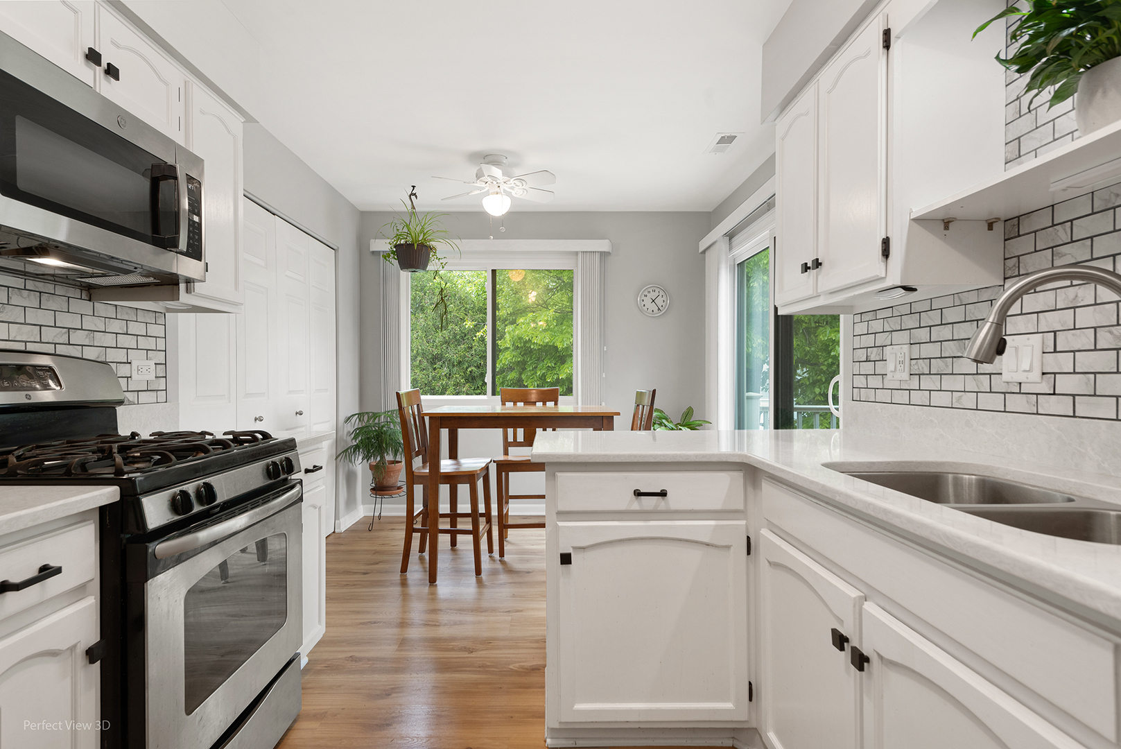 -n120 Windermere Road, Unit 2008 Winfield, IL 60190 - Photo 7 of 23 a kitchen with white cabinets and appliances