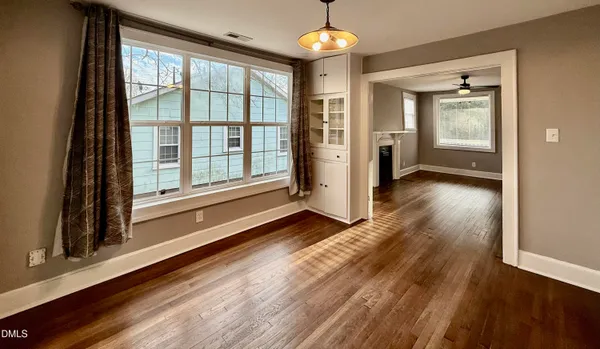 wooden floor and windows in an empty room