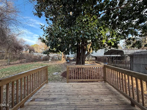 a house view with a backyard space
