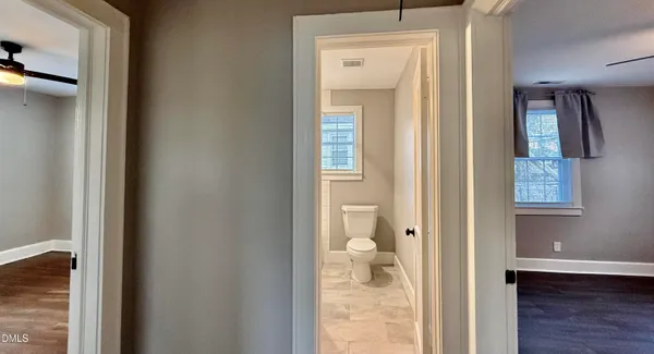a bathroom with a sink a toilet and bathtub