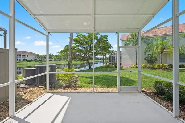 a view of a house and a backyard