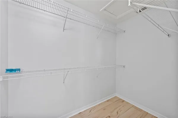 a view of a room with racks on the wall