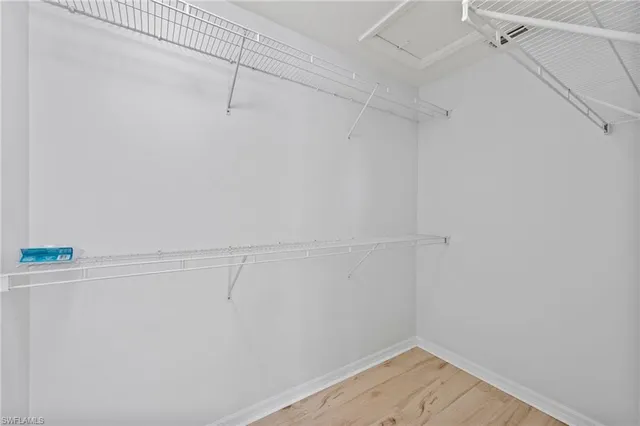 a view of a room with racks on the wall