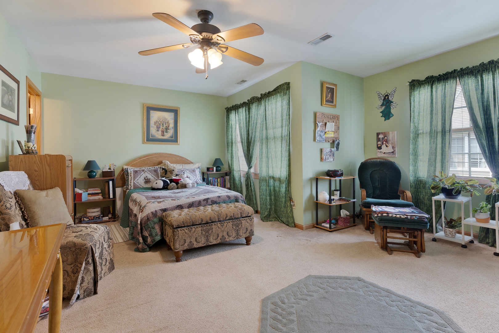 504 South Peace Road Sycamore, IL 60178 - Photo 11 of 20 a bedroom with a bed and a chandelier
