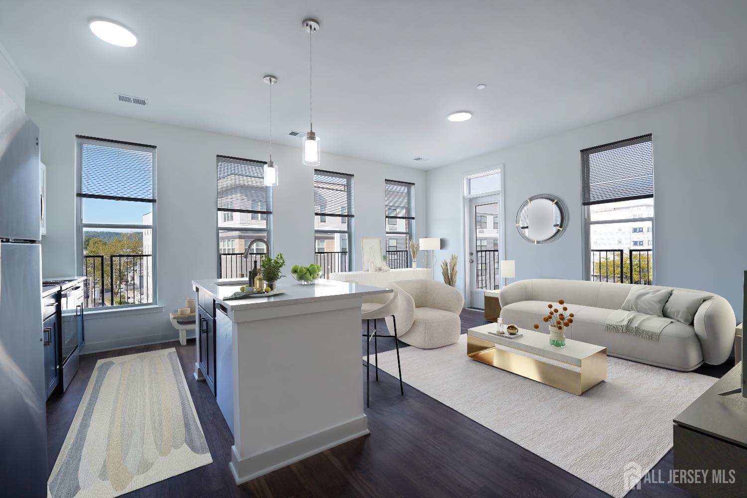 18 West Main Street, Unit 320 Bound Brook, NJ 08805 - Photo 4 of 28 a living room with furniture and a large window