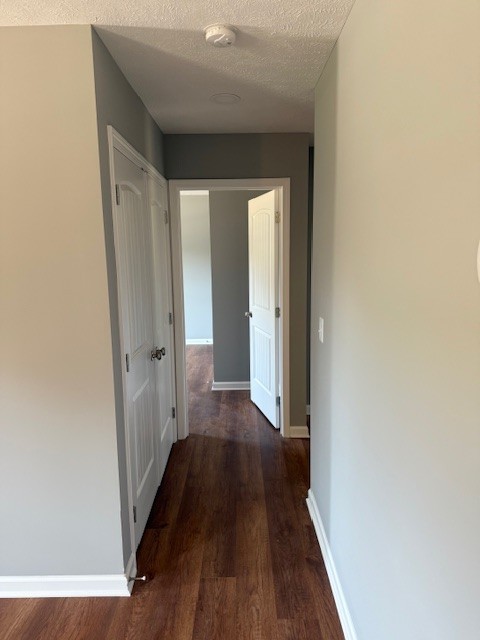 159 Hesselly Road Decherd, TN 37324 - Photo 10 of 11 a view of a hallway with wooden floor