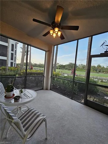 a view of a floor to ceiling window and an outdoor view