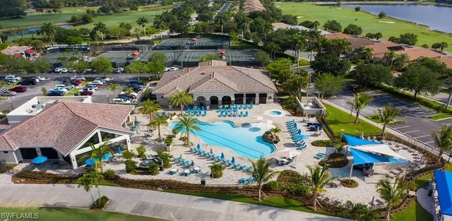 an aerial view of a houses with outdoor space and street view