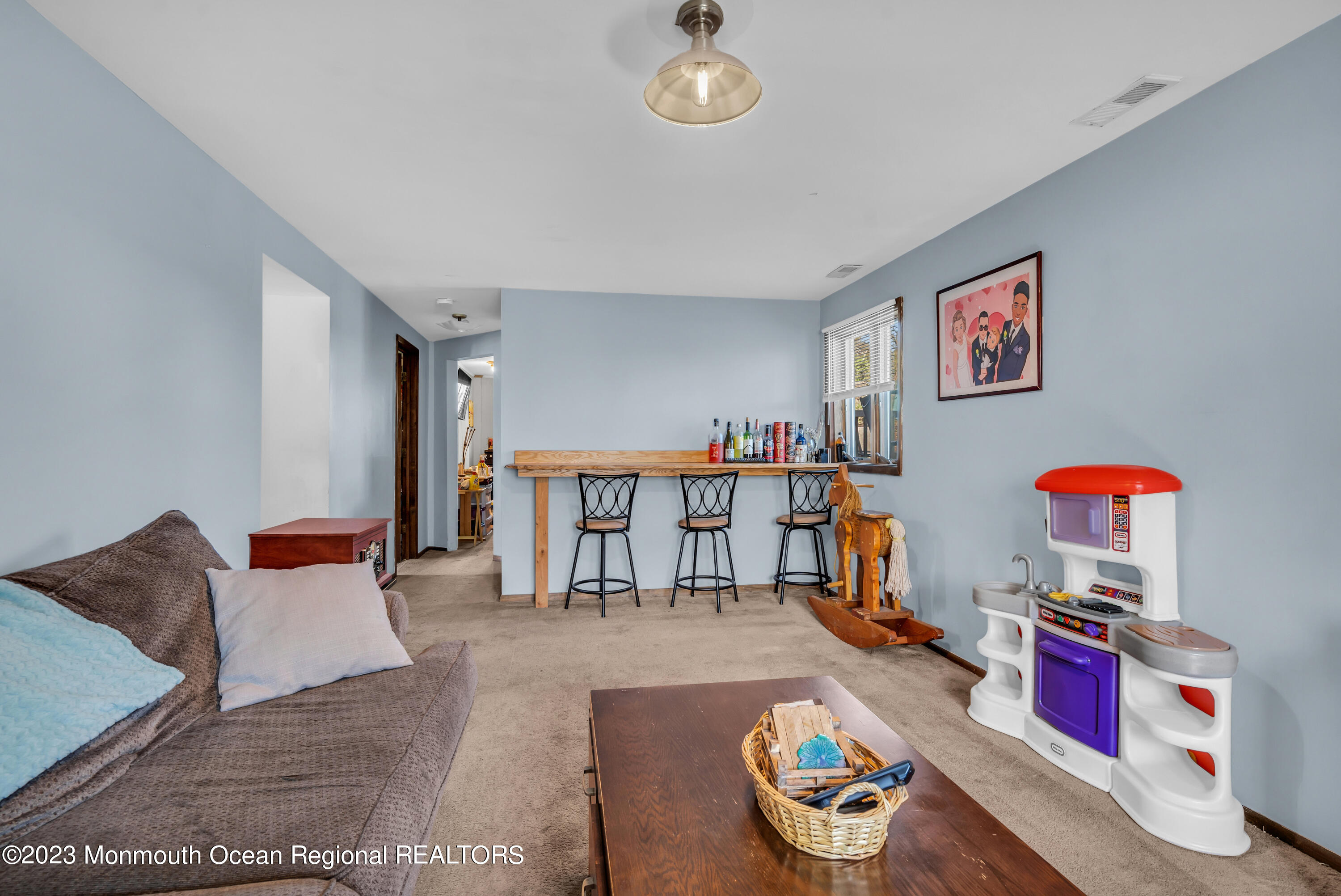20 Woodlark Road Toms River, NJ 08755 - Photo 18 of 32 a living room with furniture and a table