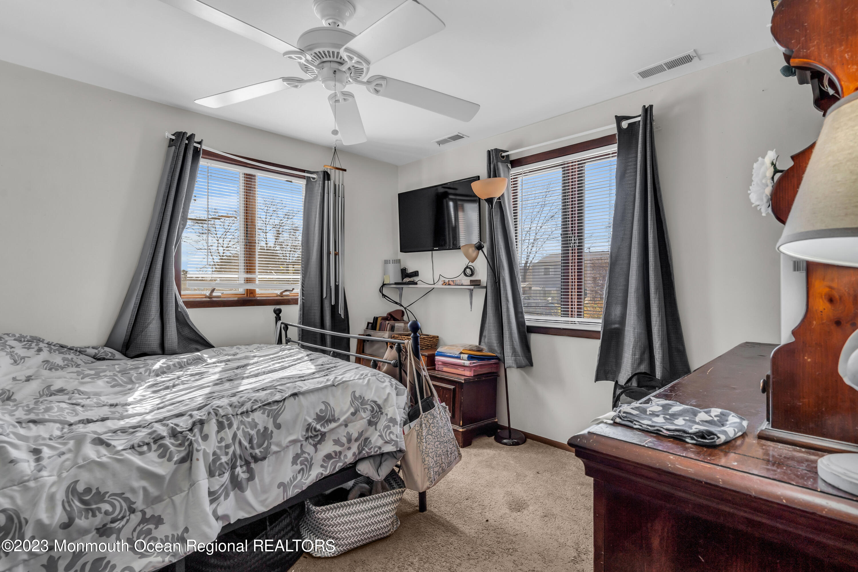 20 Woodlark Road Toms River, NJ 08755 - Photo 20 of 32 a bedroom with a bed and a table