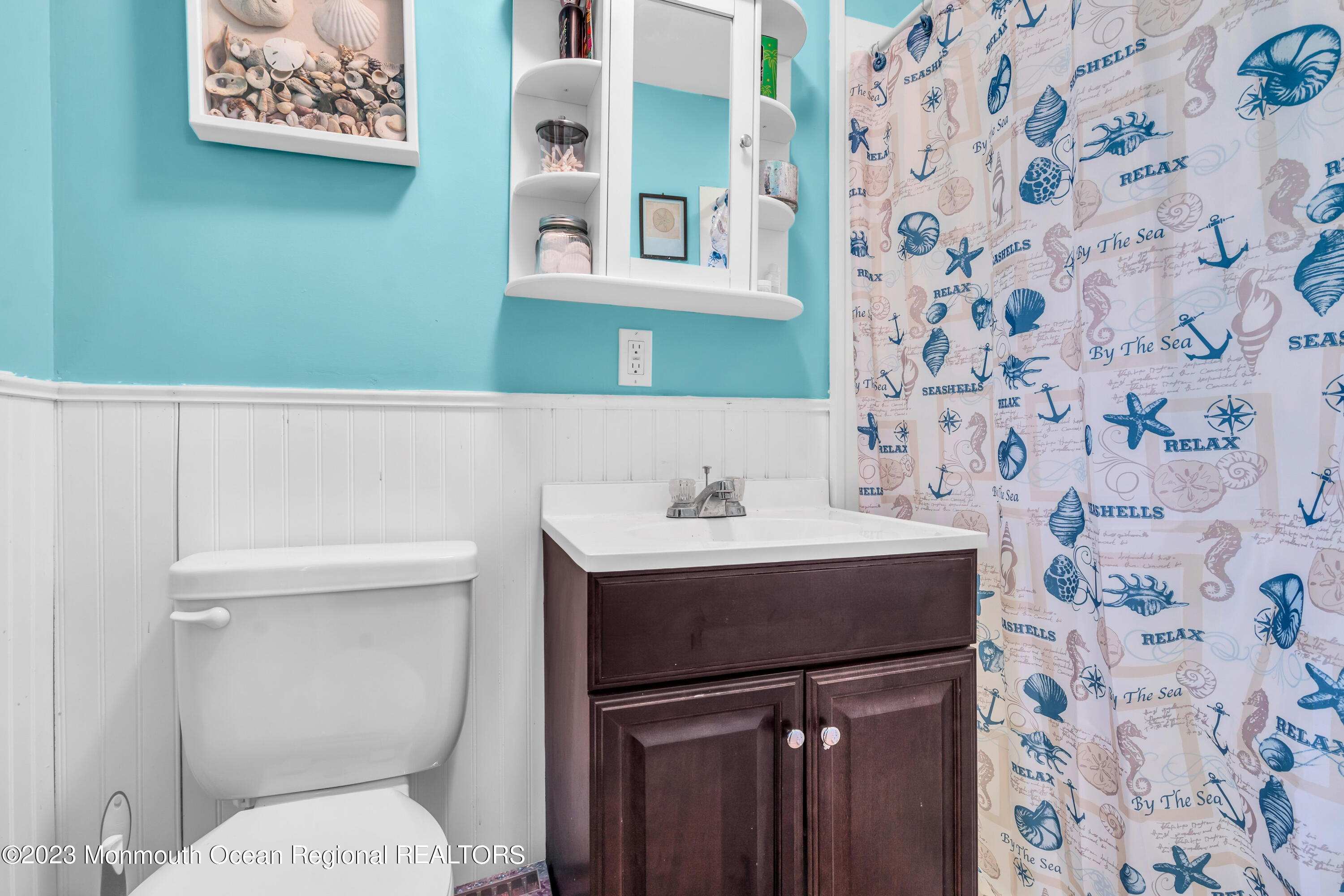 20 Woodlark Road Toms River, NJ 08755 - Photo 22 of 32 a bathroom with a sink and a toilet