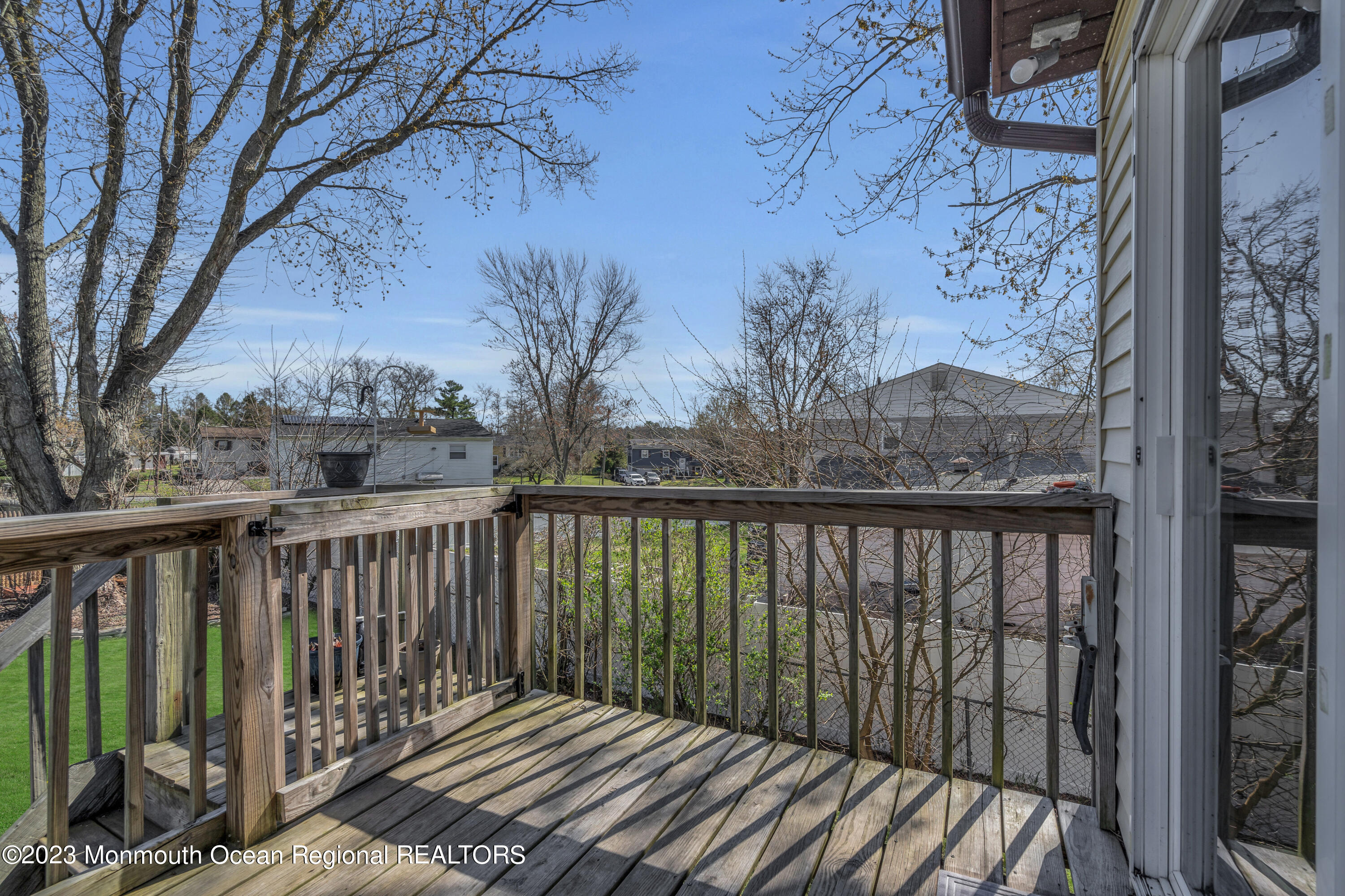 20 Woodlark Road Toms River, NJ 08755 - Photo 26 of 32 a balcony with wooden floor and fence