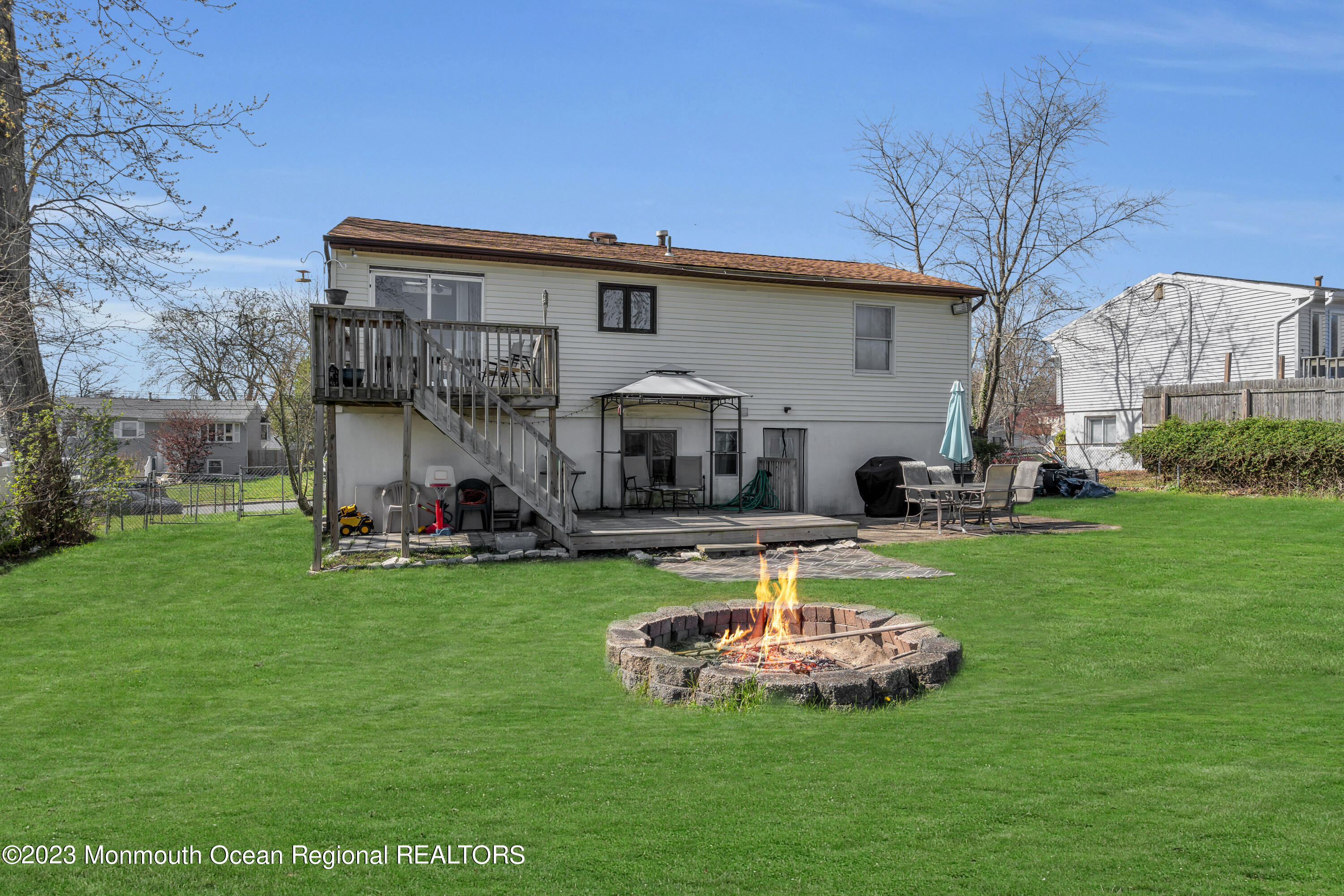20 Woodlark Road Toms River, NJ 08755 - Photo 29 of 32 a view of a house with backyard and sitting area