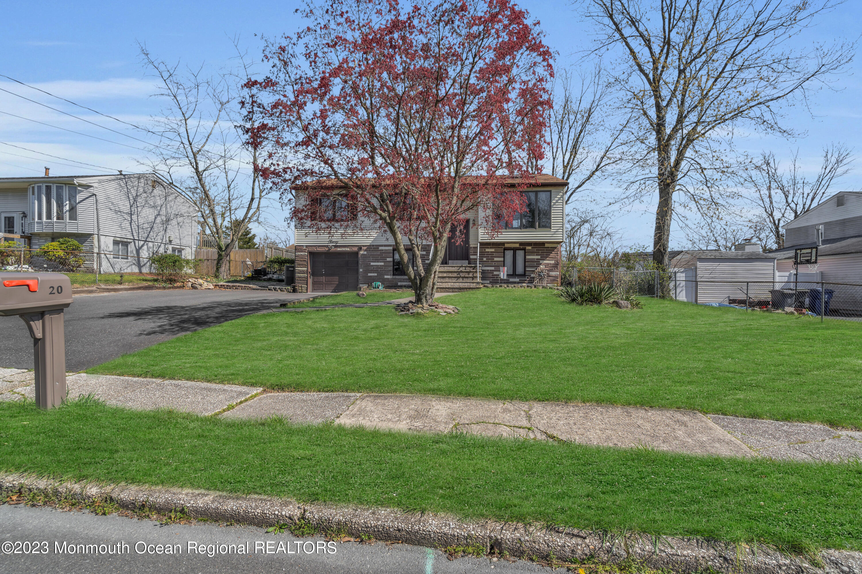 20 Woodlark Road Toms River, NJ 08755 - Photo 31 of 32 a view of a yard with plants and trees