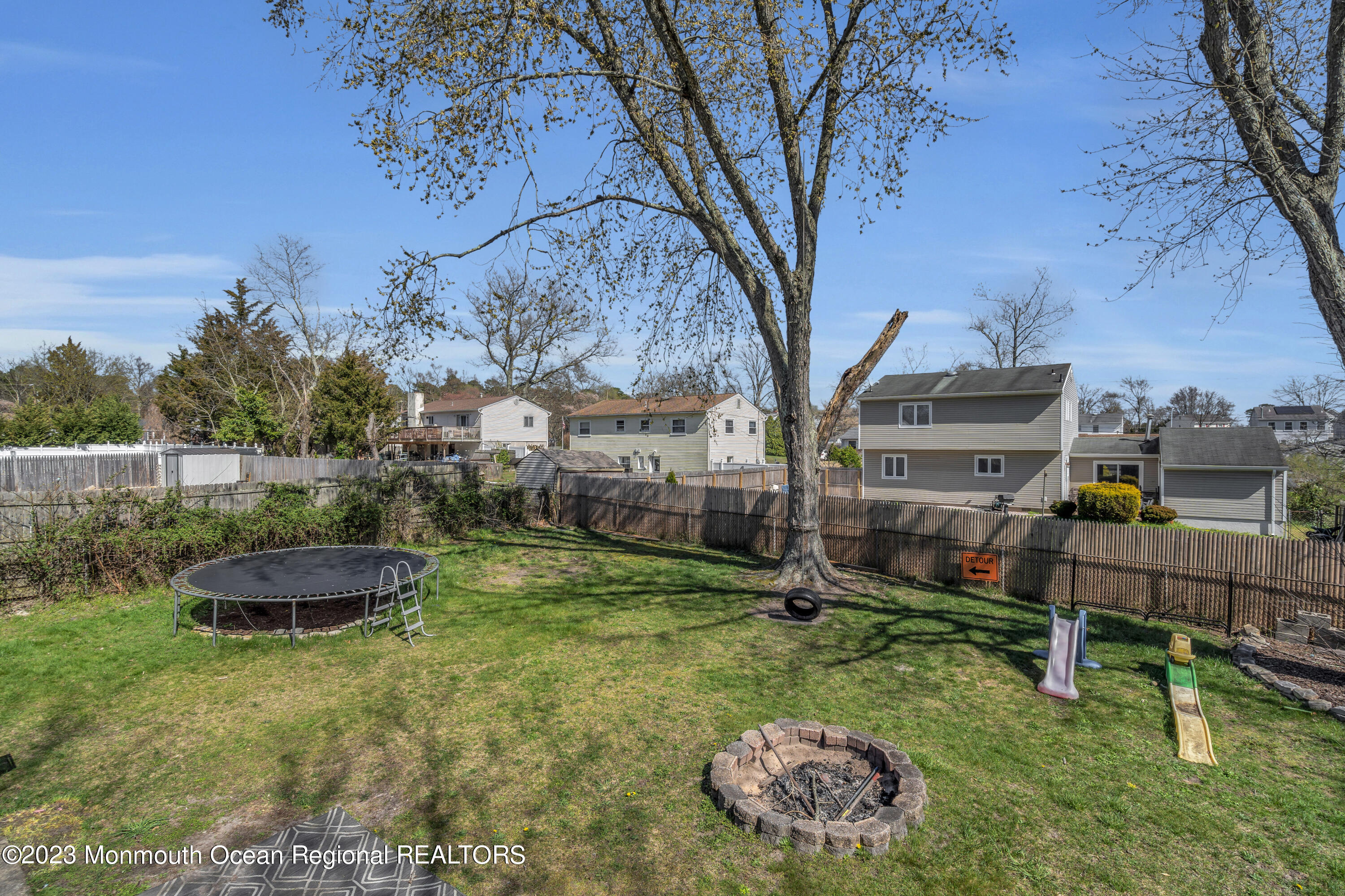 20 Woodlark Road Toms River, NJ 08755 - Photo 32 of 32 a backyard of a house with lots of green space