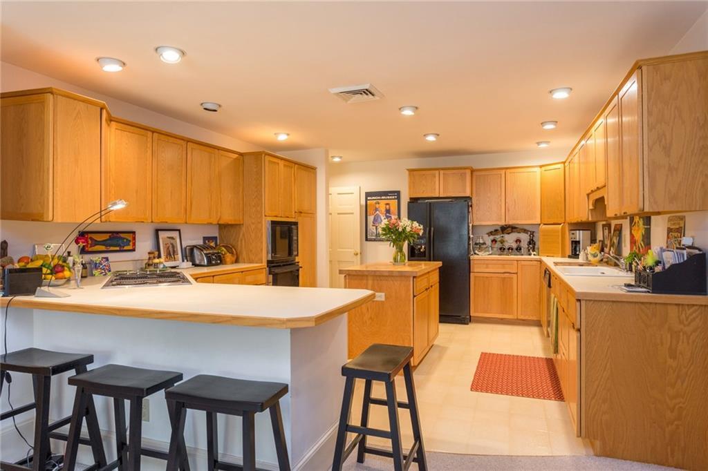 65 Godfrey Cove Road, Unit 1 York, ME 03909 - Photo 7 of 22 The large Kitchen is spacious and...