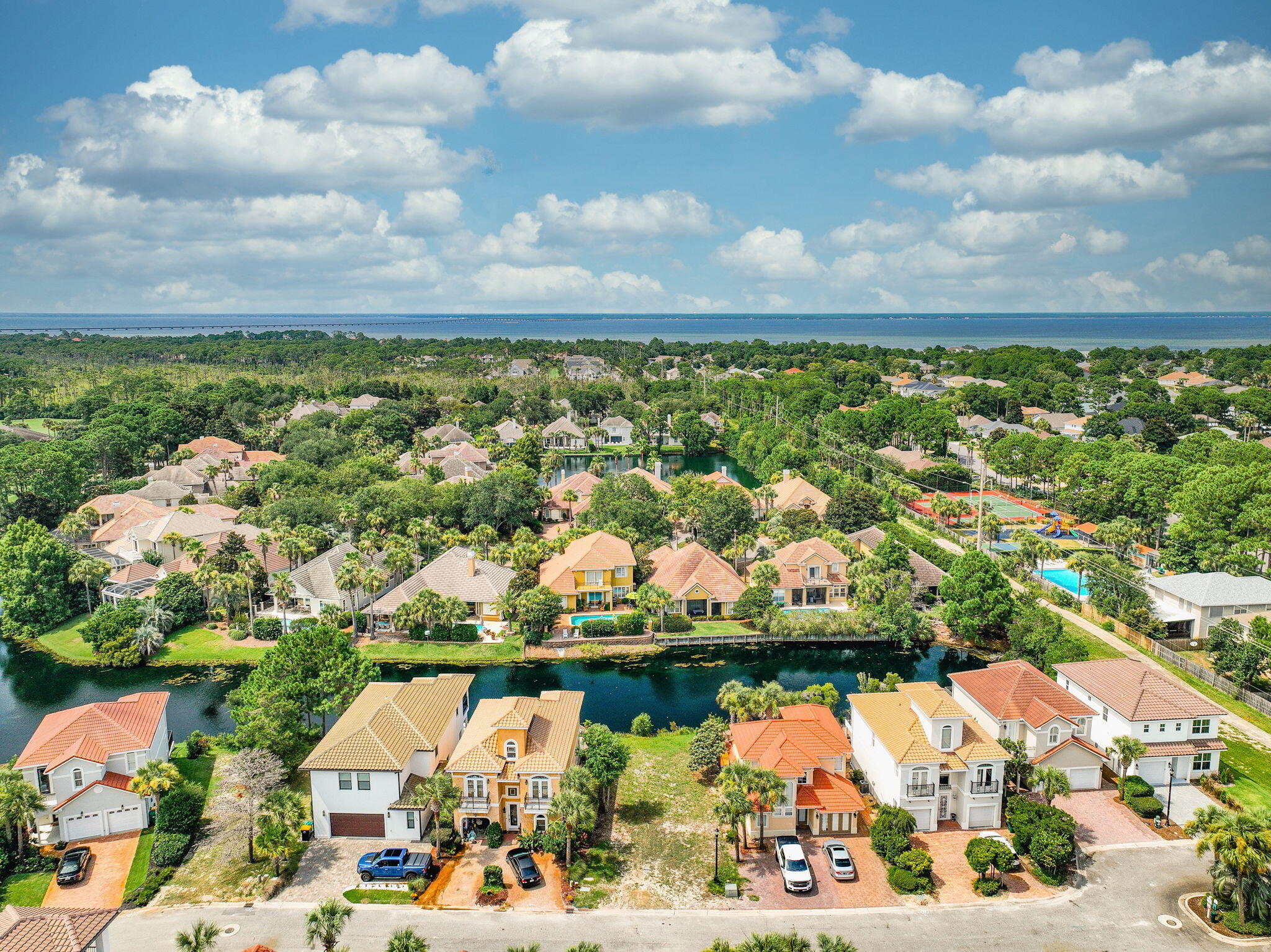 270 Calusa Boulevard Destin, FL 32541 - Photo 20 of 27 an aerial view of lake and residential houses with outdoor space