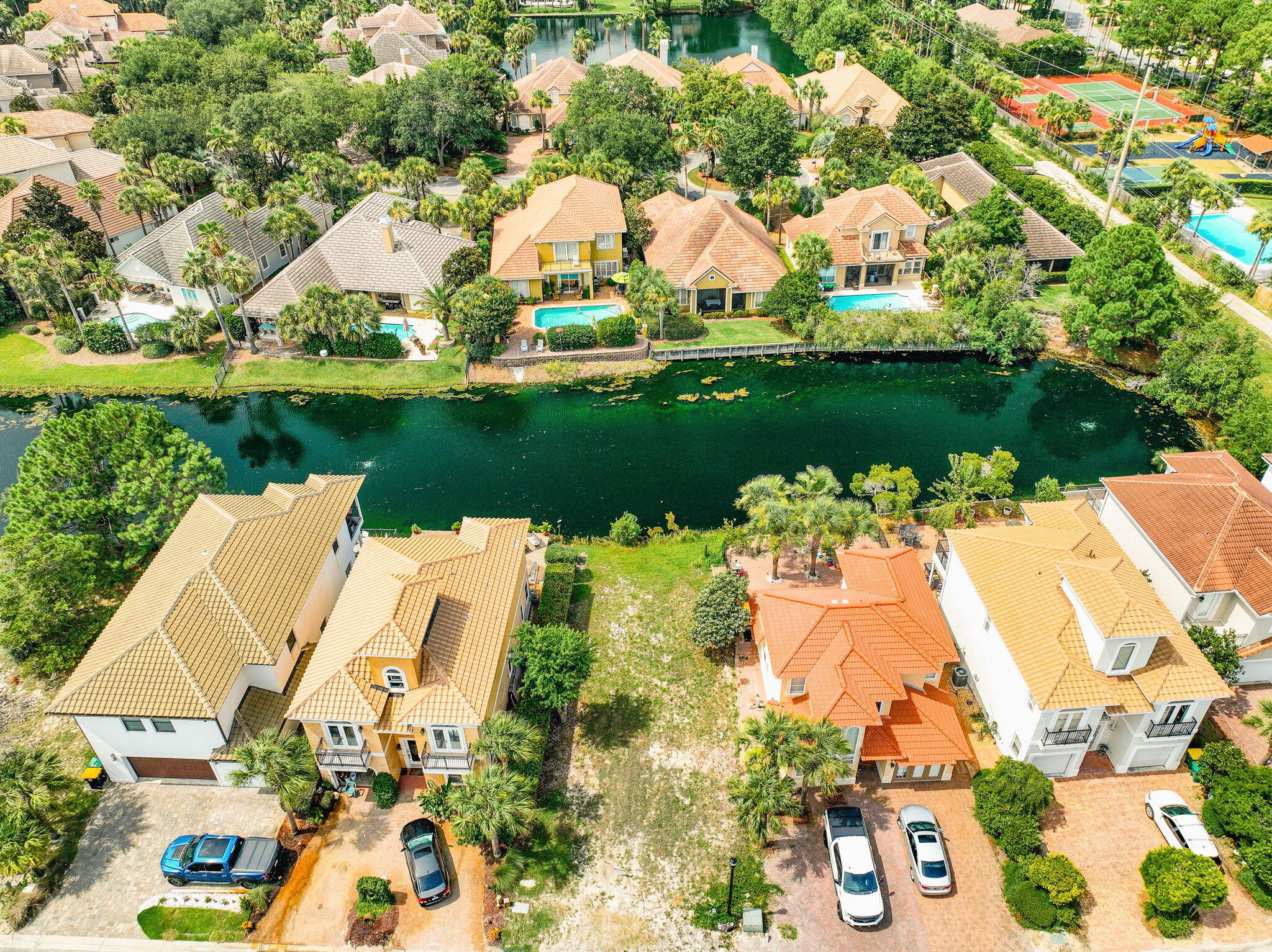 270 Calusa Boulevard Destin, FL 32541 - Photo 21 of 27 an aerial view of a house with a lake view