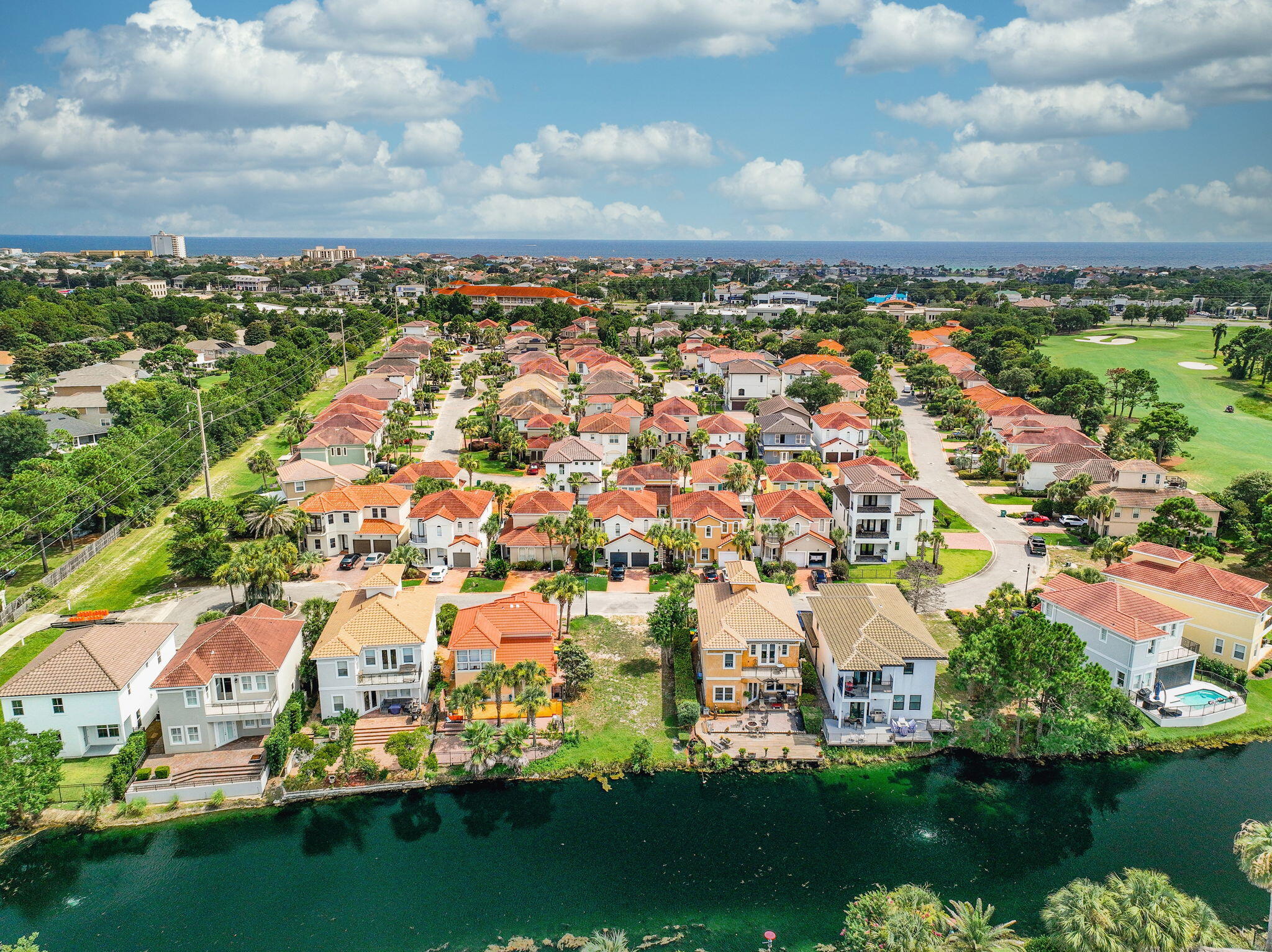 270 Calusa Boulevard Destin, FL 32541 - Photo 23 of 27 an aerial view of residential building with outdoor space and lake view