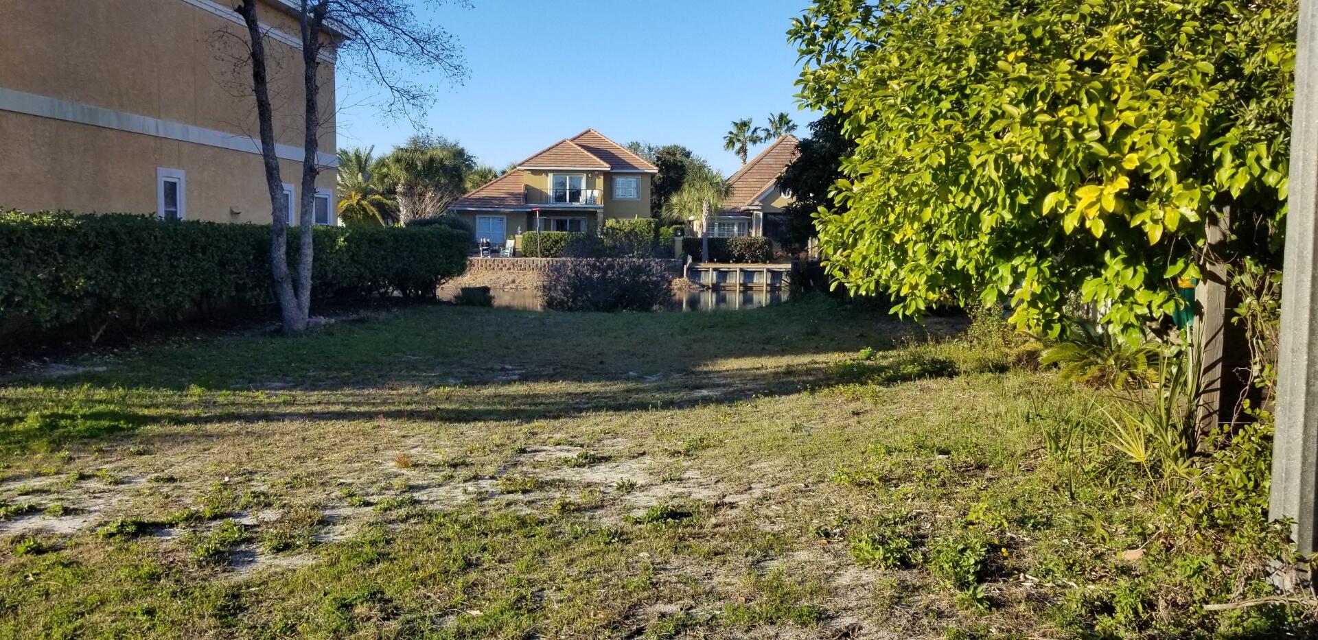 270 Calusa Boulevard Destin, FL 32541 - Photo 9 of 27 a view of a house with a yard