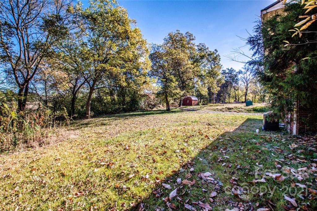3748 Woodleaf Road Salisbury, NC 28147 - Photo 31 of 31 a view of dirt yard with a tree